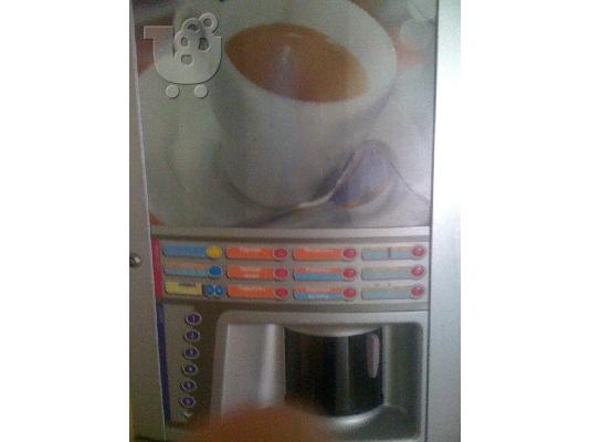PoulaTo: vending compi diplo kafe kai vitrina mazi