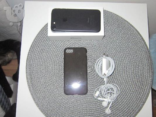 PoulaTo: Iphone 7 noir 128Go comme neuf avec facture