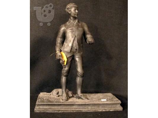 PoulaTo: Μεταλλικό άγαλμα, Άγγλος κυνηγός