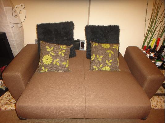 Πρακτικός καναπές-κρεβάτι με αποθηκευτικό χώρο