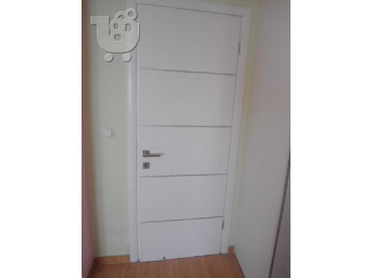 ΠΟΡΤΑ ΕΣΩΤΕΡΙΚΟΥ ΧΩΡΟΥ ΧΡΩΜΑ ΛΑΚΑ ΛΕΥΚΗ ME INOX ΒΕΡΓΑ 2,03 Χ 0,68...