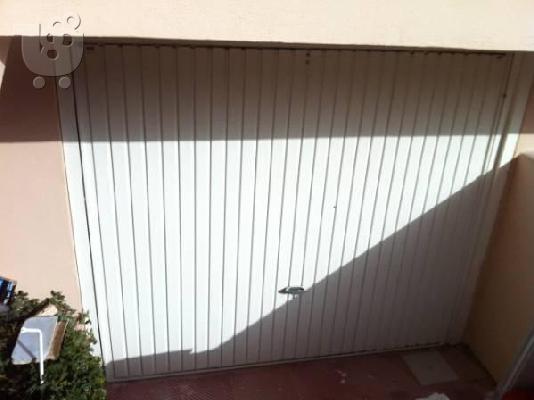 PoulaTo: Γκαραζοπορτα αλουμινίου