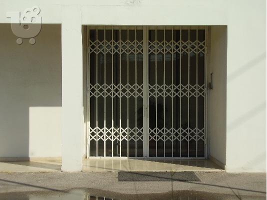 Πτυσσόμενες πόρτες ασφαλείας μασίφ. 120 ευρώ τ.-μ.