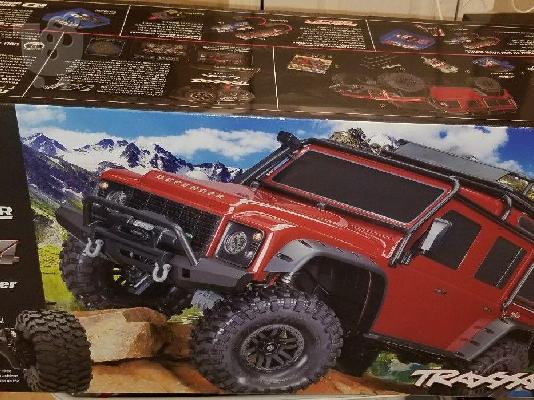 PoulaTo: Traxxas TRX-4 1/10 Scale Trail Rock Crawler W/Land Rover Defender W/XL-5 ESC & TQi 2.4GHz Radio - REALWORLDHOBBY