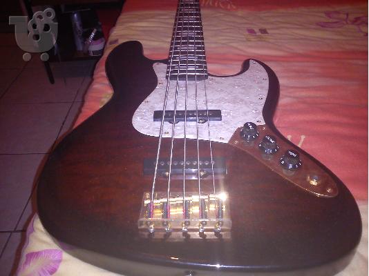 PoulaTo:   sx vintage custom 5 string gold keys bass