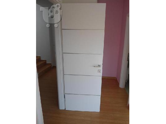 ΠΟΡΤΑ ΕΣΩΤΕΡΙΚΟΥ ΧΩΡΟΥ ΧΡΩΜΑ ΛΑΚΑ ΛΕΥΚΗ ME INOX ΒΕΡΓΑ 2,03 Χ 0,73...