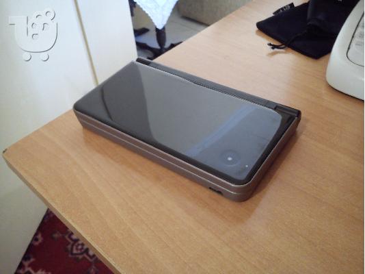 Nintendo DSi XL + 11 games