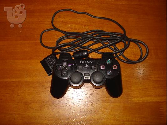 Πωλείται μεταχειρισμενο Playstation 2 με τρια παιχνιδια και τιμονιερα...