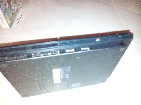 Playstaiton 2 slim με 14 παιχνίδια.