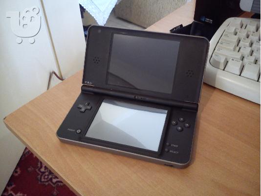 Nintendo DSi XL + 11 games