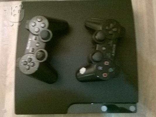 πωλείται ps3 slim μαύρο με 2 χειριστήρια και 5 παιχνίδια...